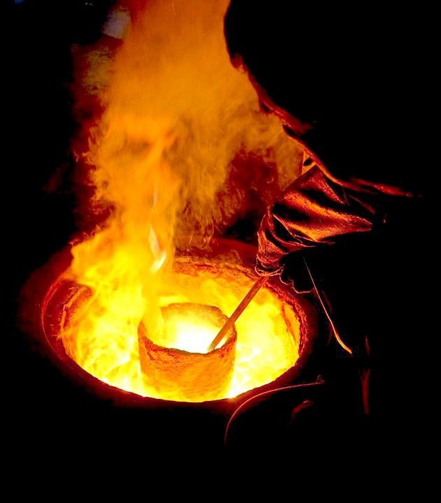 Molten gold being poured during smelting